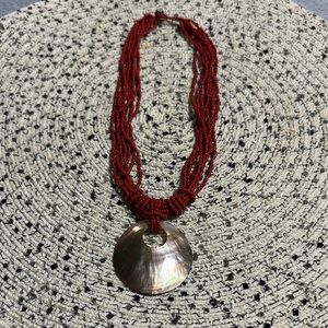 Red Beaded Necklace with Shell Pendant